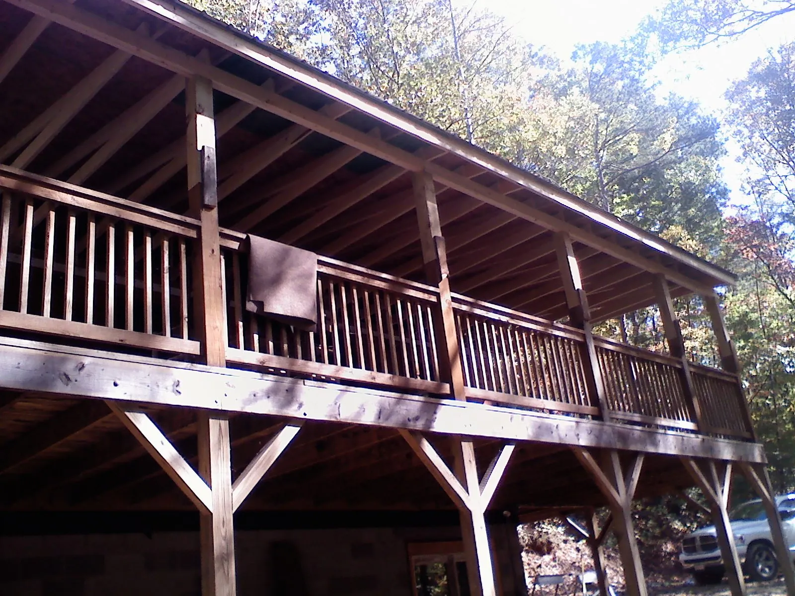 Timber framing under a new elevated porch and deck — Roof Leak Repair in Montebello by Roofing Brothers